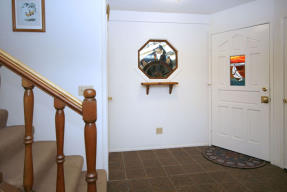 Entry way with 2 beautiful stain glass windows