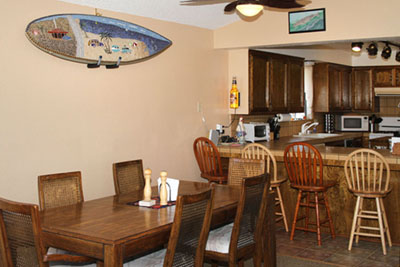 The kitchen bar seats 4, Dining table can expand to seat up to 10 The kitchen bar seats 4, Dining table can expand to seat up to 10