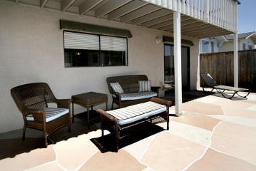 The Patio is a great place to sun-bath, chat or relax. Fenced Patio