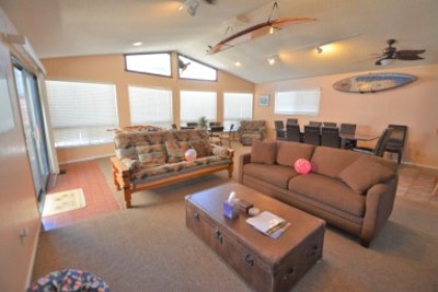 The large family room with multiple entertaining areas Large family room can hold your whole group.