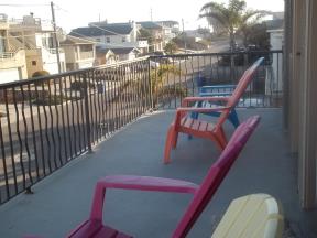 The balcony provides a pleasant place to relax and watch the world go by or get some morning sun.