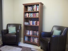 The library includes a wide selection of books, magazines and movies