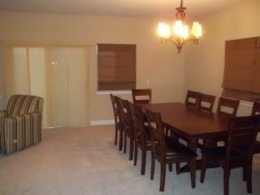 The upstairs family room dining table seats 10