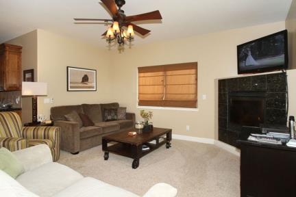 Upstairs Family Room includes a gas fireplace, television, Karaoke machine