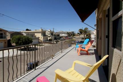 The balcony provides a pleasant place to relax and watch the world go by or get some morning sun.